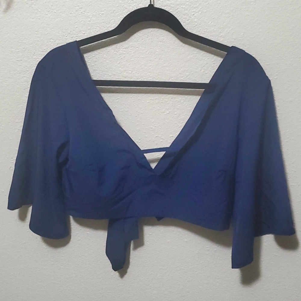 Womans navy blue crop top blouse.